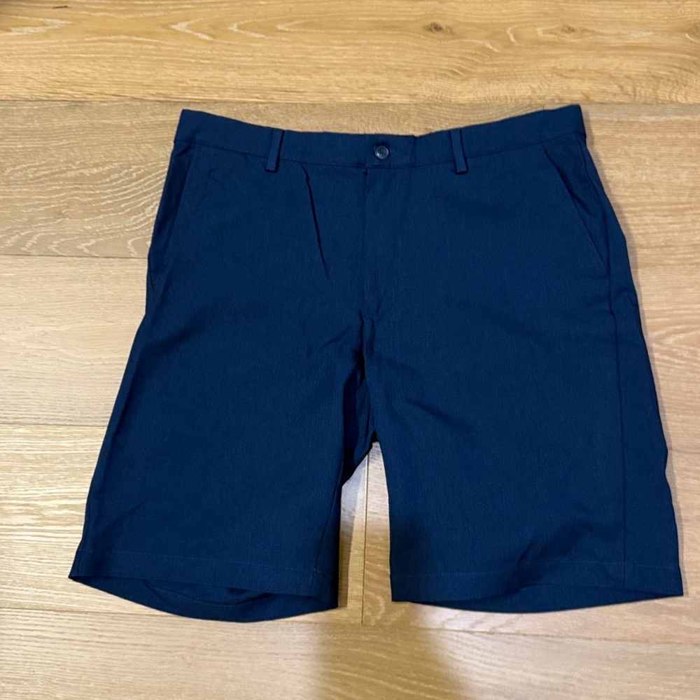 Greg Norman Navy Shorts size 36 EUC